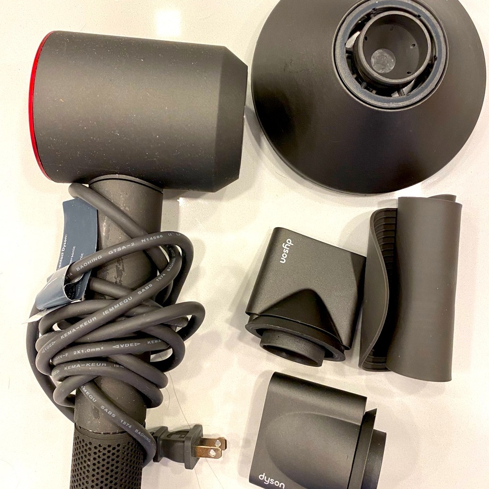 Dyson hairdryer with accessories